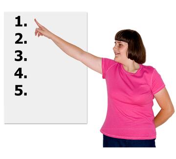 A woman pointing to a piece of paper which has the numbers 1 to 5 on it.