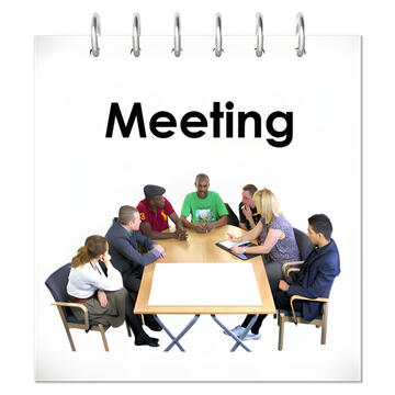 A calendar page showing a meeting with people sitting around a table.