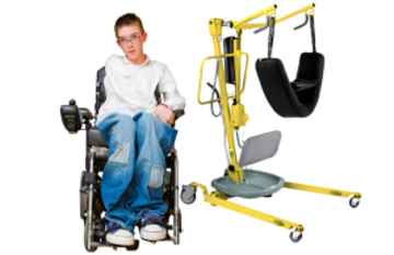 A photograph of a young man in a wheelchair next to a piece of lifting equipment