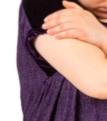 a hand on a rolled up sleeve