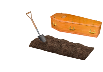 A coffin next to some soil which is being dug into by a spade