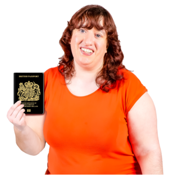 woman holding up a passport and smiling