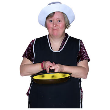A woman holding a frying pan with a pancake