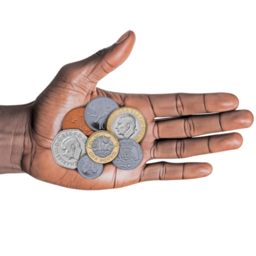 A hand holding lots of coin s
