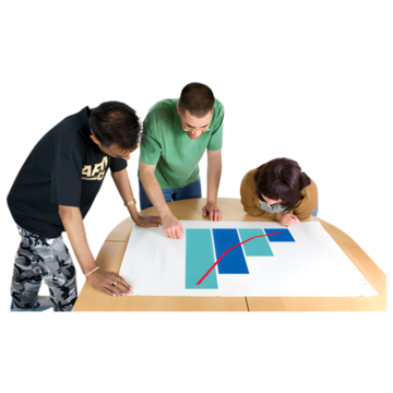 Three people looking at a graph on a table