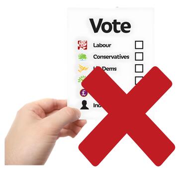 A red cross beside a hand holding a ballot paper.