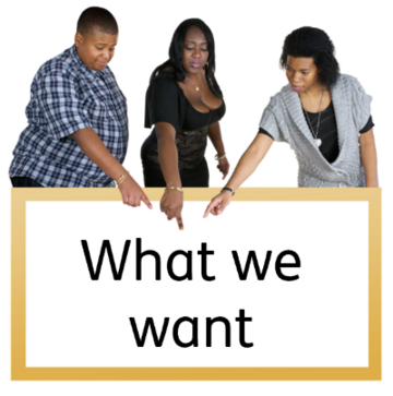 A picture of 3 women pointing at a sign below them which says 'What we want'