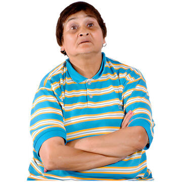 A woman with her arms folded and looking up.