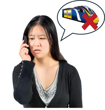 A lady on her phone with a speech bubble with a train and a red cross in it.