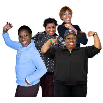 A group of Black women looking happy.