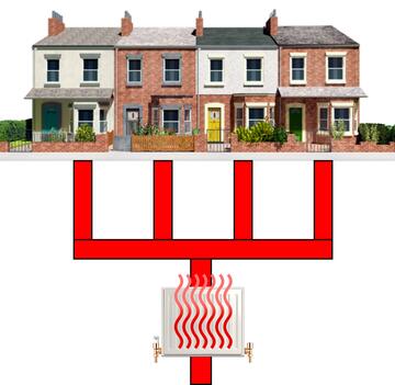 A row of houses with red pipes going to them and a radiator.