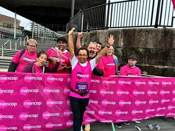 Michael Beynon with a group of people while running 
