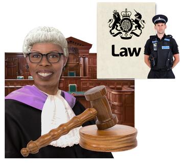 A judge in a court room with a policeman and a document which says law on it.