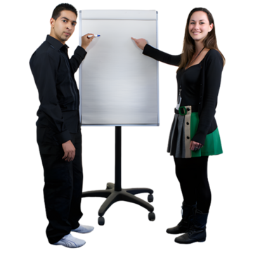 Two people standing beside a blank flip chart, one holding a marker.