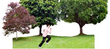 A person running in front of some trees.