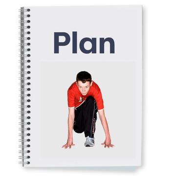 A booklet with the word plan on the cover and a picture of a boy crouched down ready to start a race.