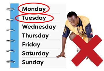 A diary with circles around Monday and Tuesday.  Beside the diary is a man in running gear crouching down and a red cross beside him. 