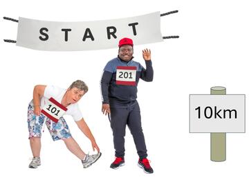 2 people in running clothes by a start banner and a sign that says 10km.