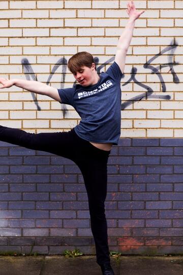 Andrew Self dancing in the street