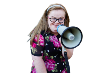 Heidi a Mencap Mythbuster holding a loud speaker