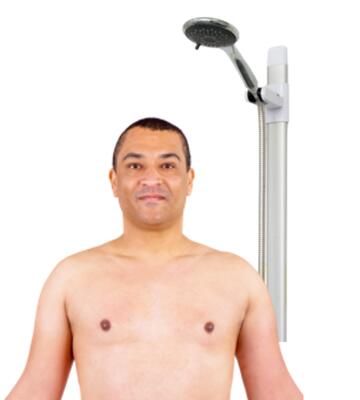 A man standing under a shower.