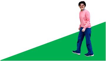 A man walking down a hill.