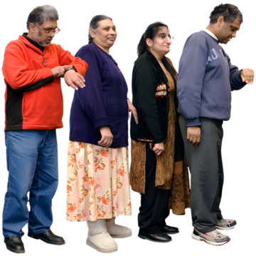 Four people standing in a line with two people looking at their watches