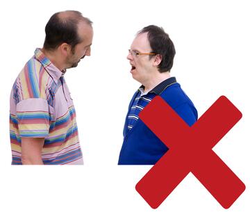 A man talking to another man with a red cross beside one of them.