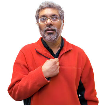A man pointing to himself.