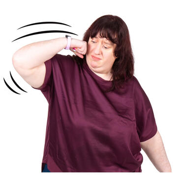 A woman punching her own cheek.