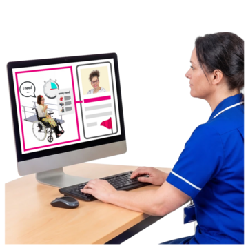 A nurse looking at a computer screen which has an image of a lady in a wheelchair on it and a red flag.