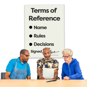 Three people reading a sheet of paper called Terms of Reference