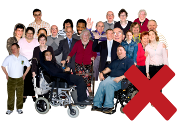 A large group of people with a red cross beside them.