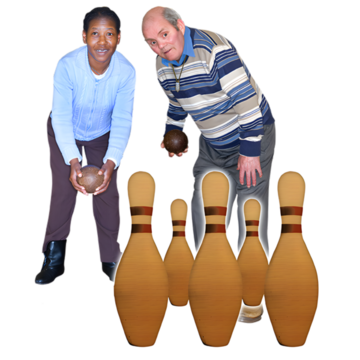 Two people playing skittles.
