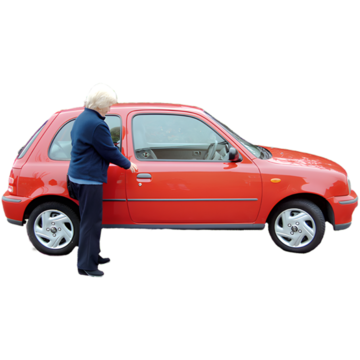 A person stood by their red car