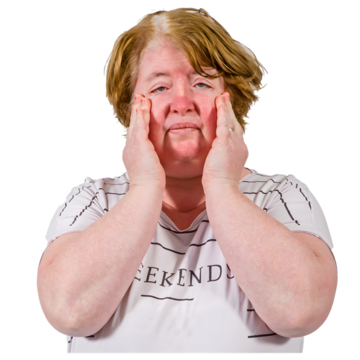 A woman too hot with her hands to her face