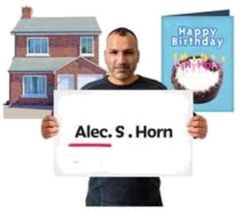 A Man holding up a card