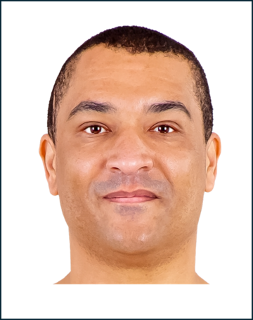 A photo of a man's head and shoulders.