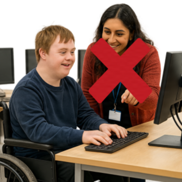 a young man being helped to use a computer but the support worker has a red cross over them