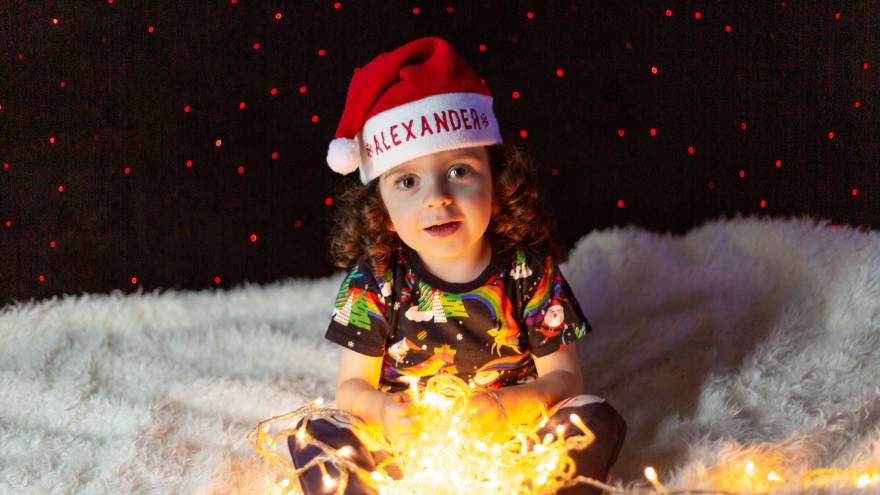 Little boy with christmas lights