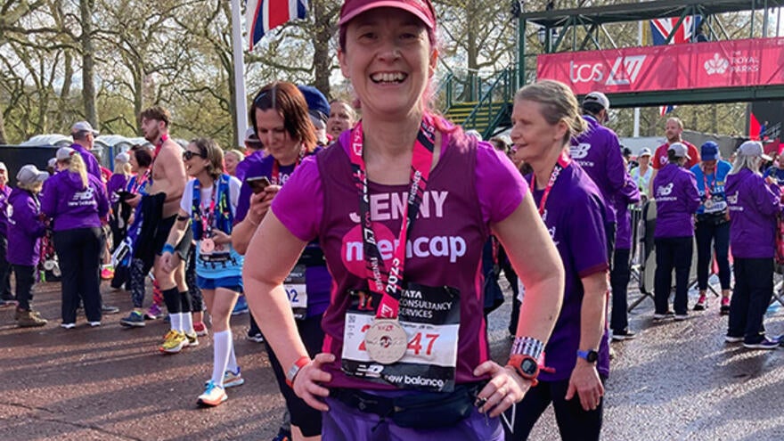 Jenny smiles at the camera after completing the London Marathon