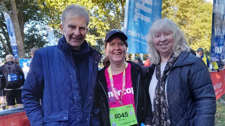 Gina with friends at the finish line