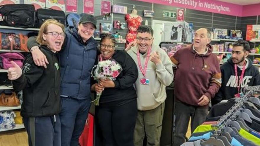 A group from Me Time Nottingham celebrating the end of their placement at Clifton Mencap shop