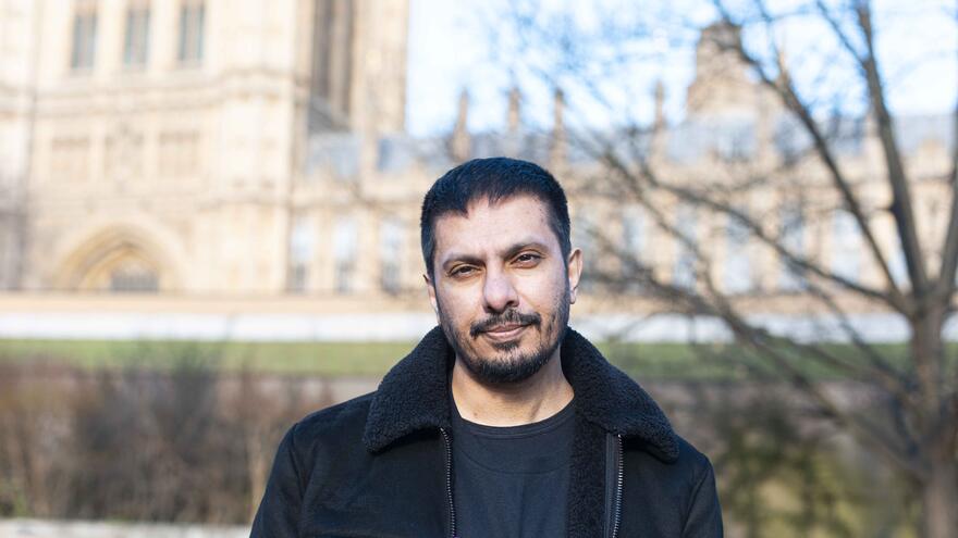 Ismail standing in front of parliament 