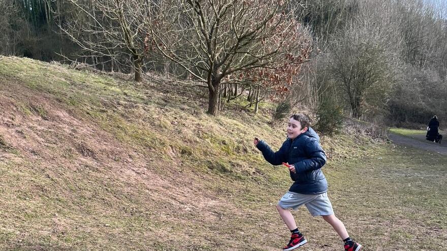 Cooper Running in Park