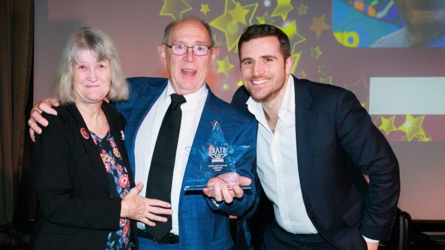 John with his award