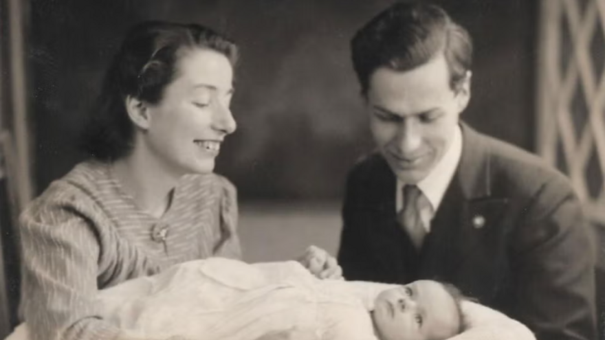 Judy Fryd with her husband and baby daughter