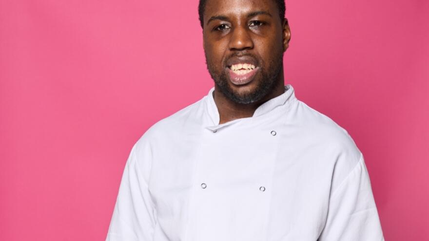 Aaron wearing his kitchen whites