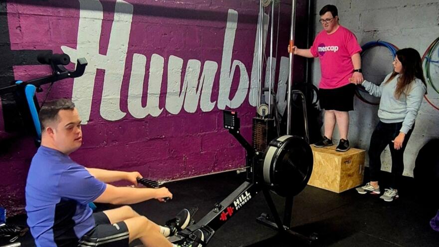 Two people in a gym