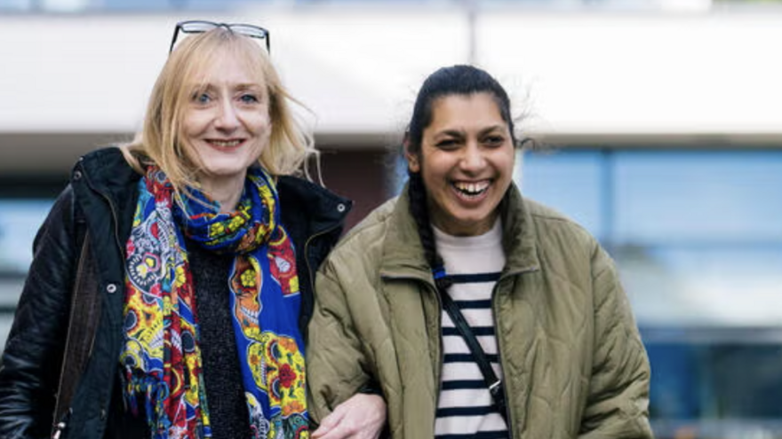 People smiling and walking